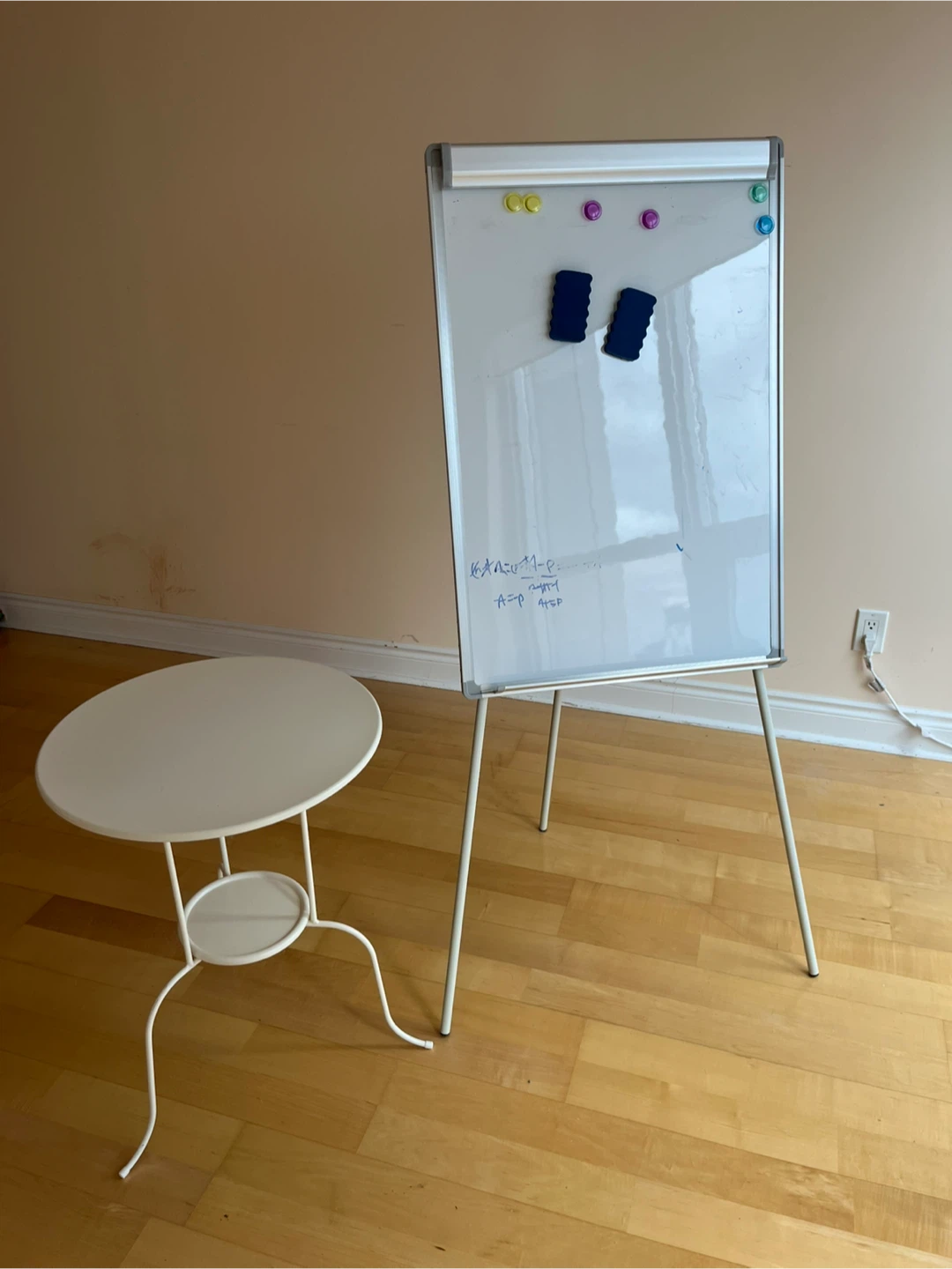 Whiteboard and Small Round Table