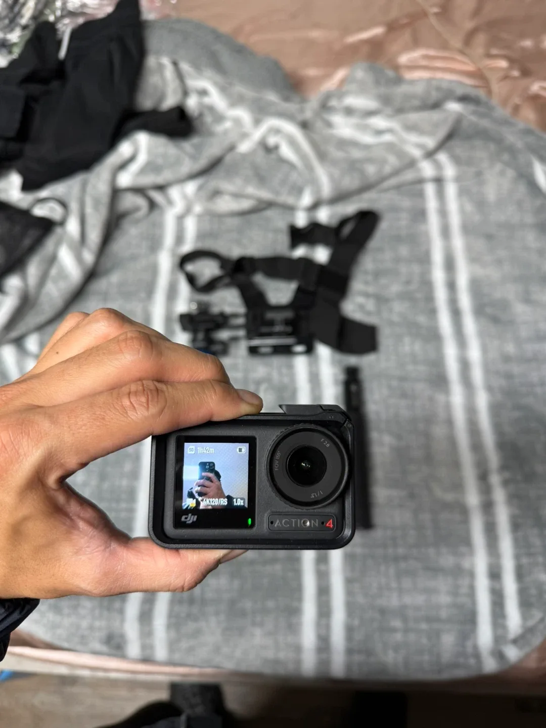 DJI Action 4 Camera with Accessories image indicator(3)