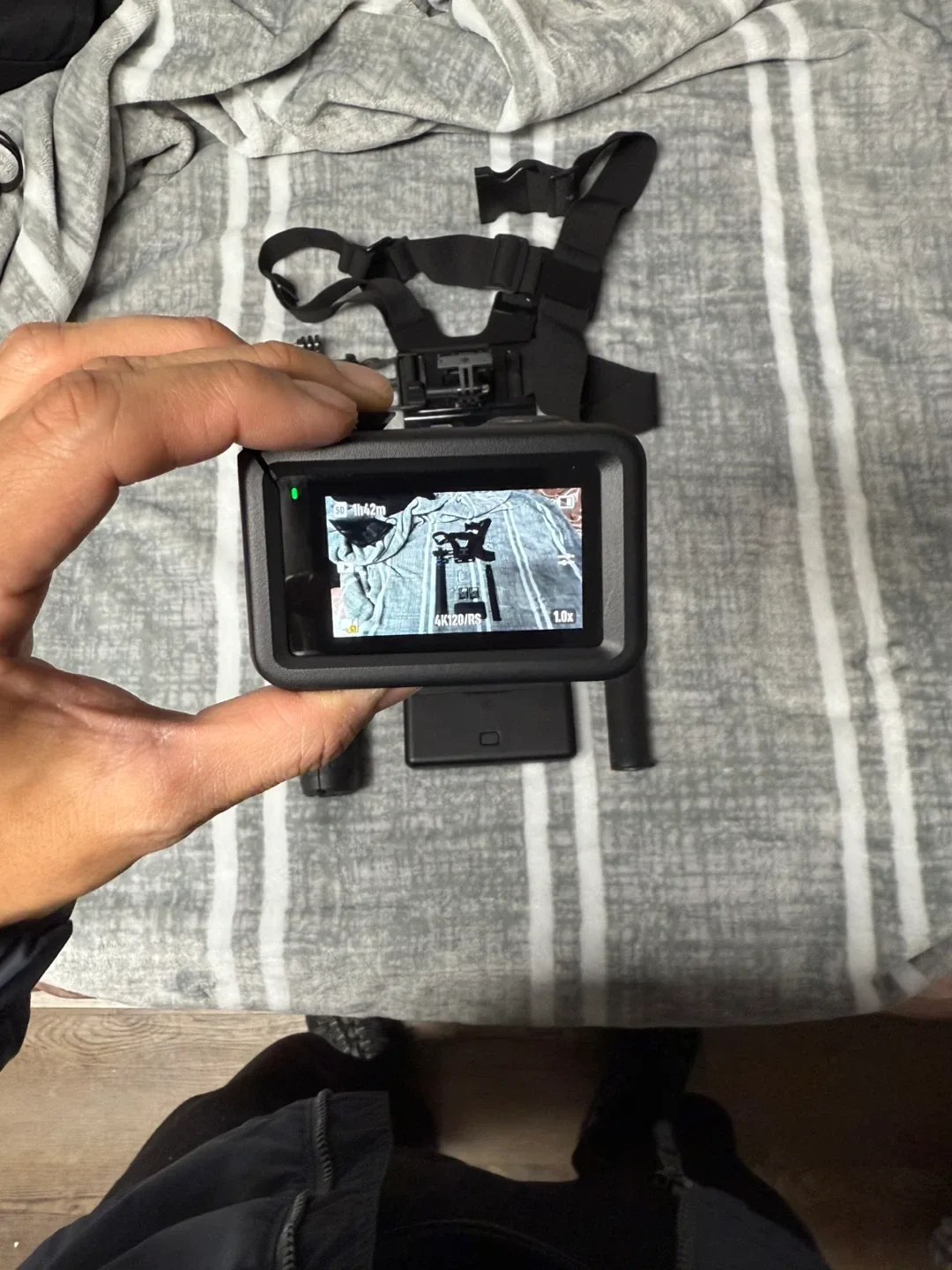 DJI Action 4 Camera with Accessories image indicator(2)