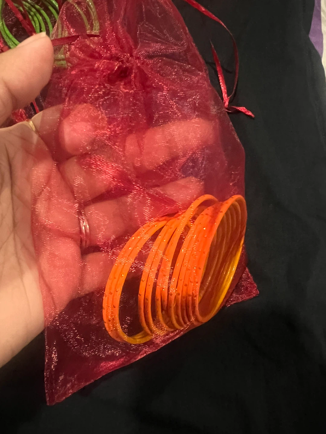 Orange Bangles in Red Pouch
