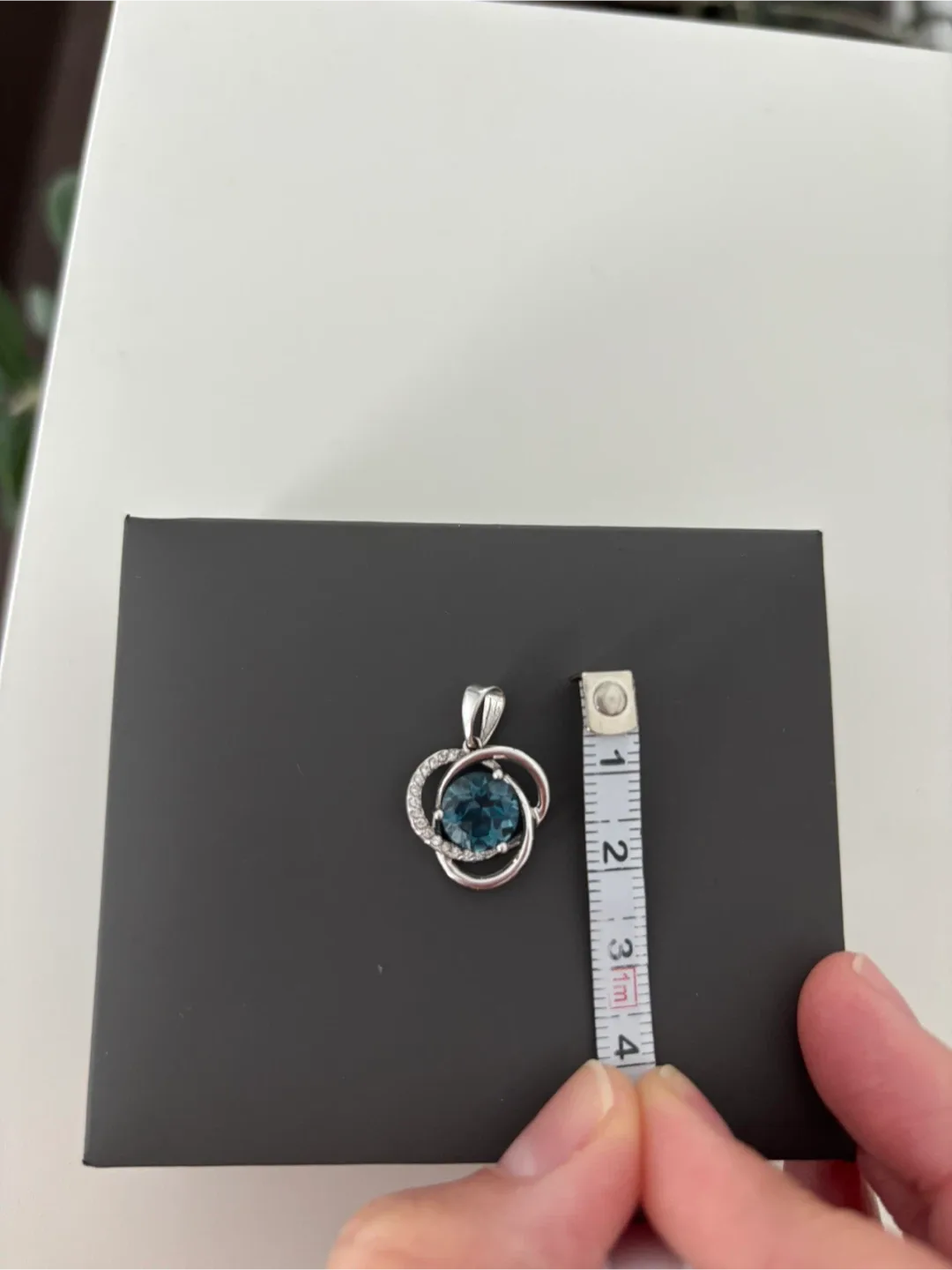 14K White Gold Pendant with Blue Topaz and Cubic Zirconias image indicator(3)