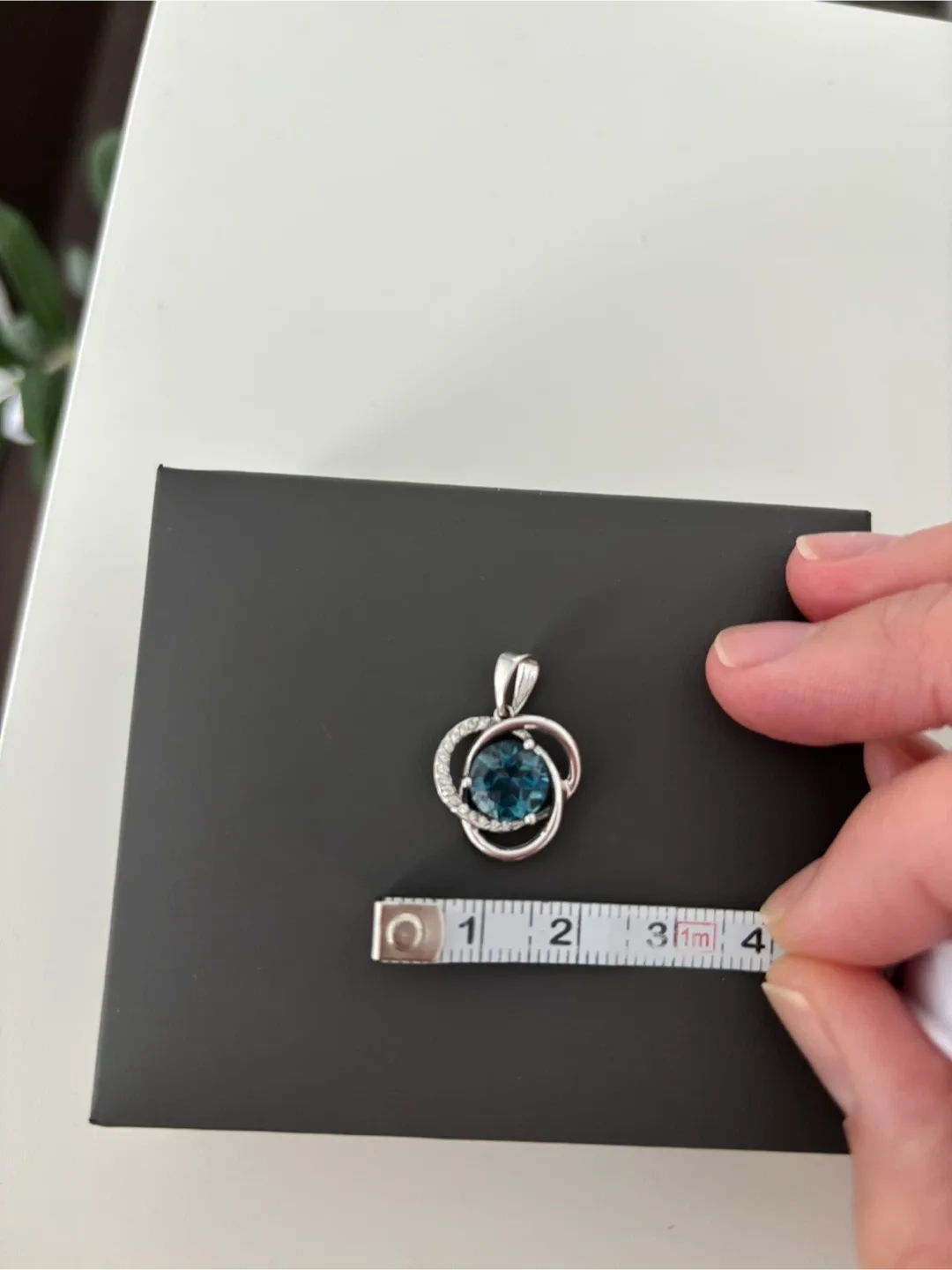 14K White Gold Pendant with Blue Topaz and Cubic Zirconias image indicator(2)