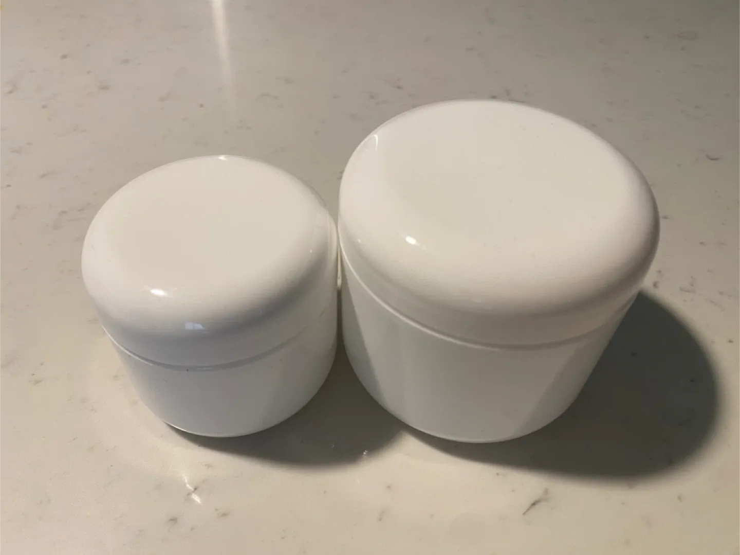 Assorted Empty White Cosmetic Containers image indicator(3)