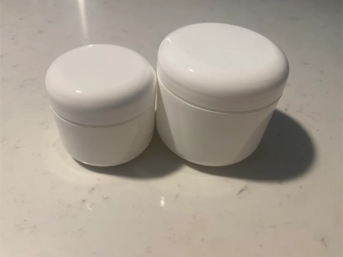 Assorted Empty White Cosmetic Containers image indicator(2)