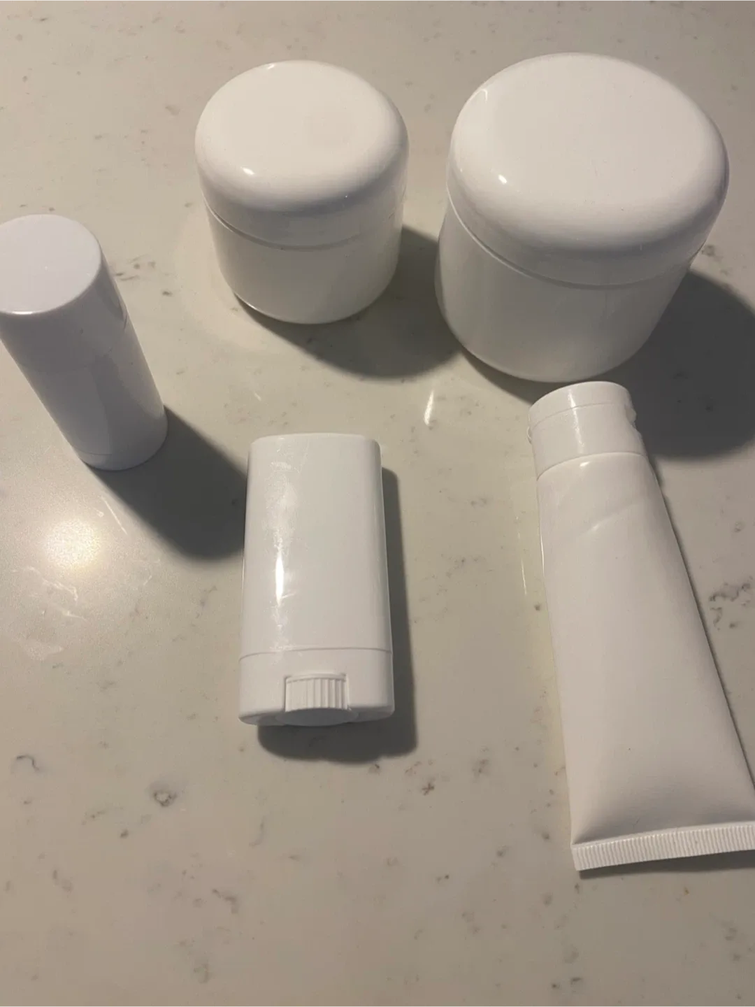 Assorted Empty White Cosmetic Containers image indicator(4)