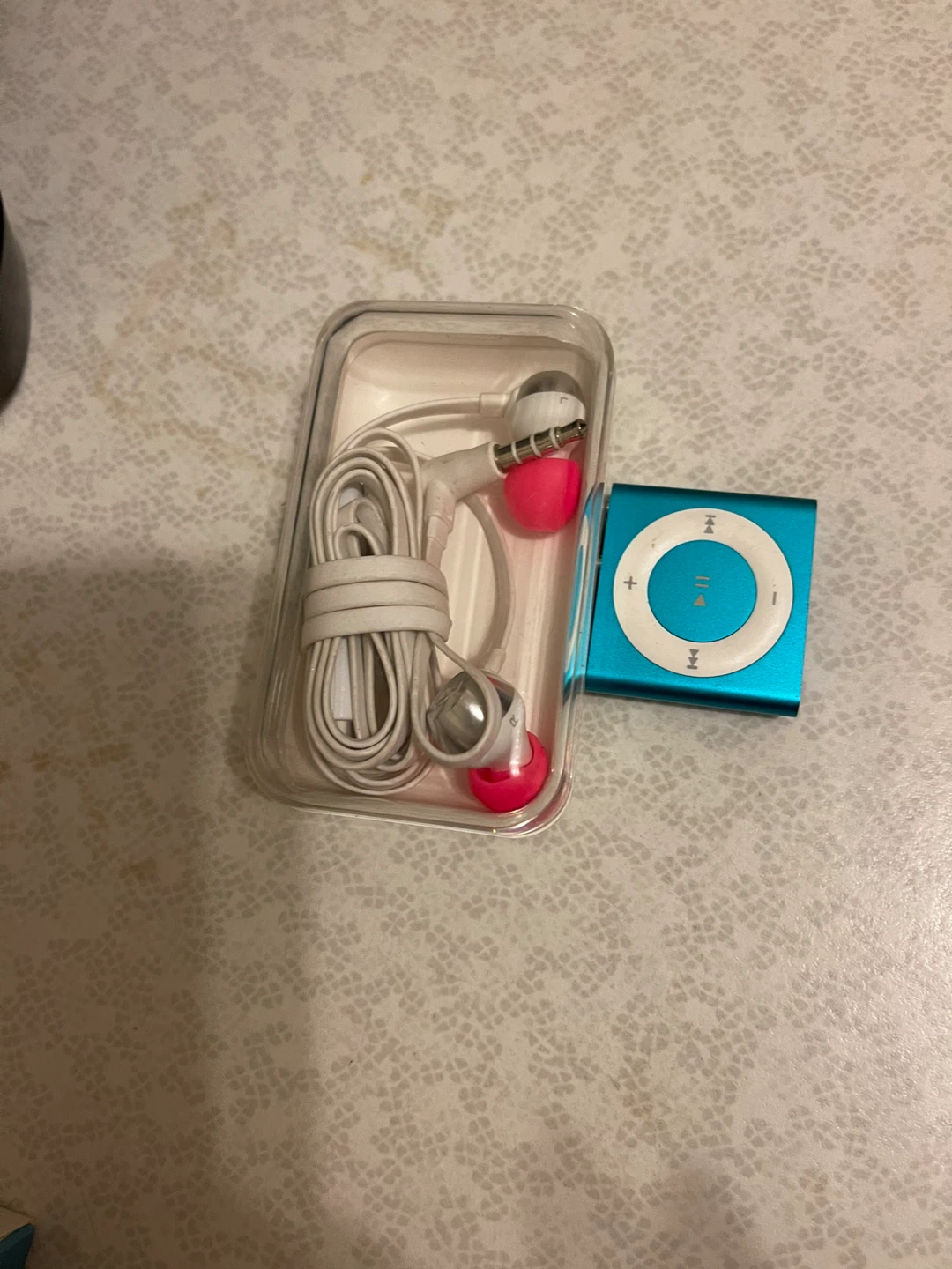 Turquoise Apple iPod Shuffle with Earphones