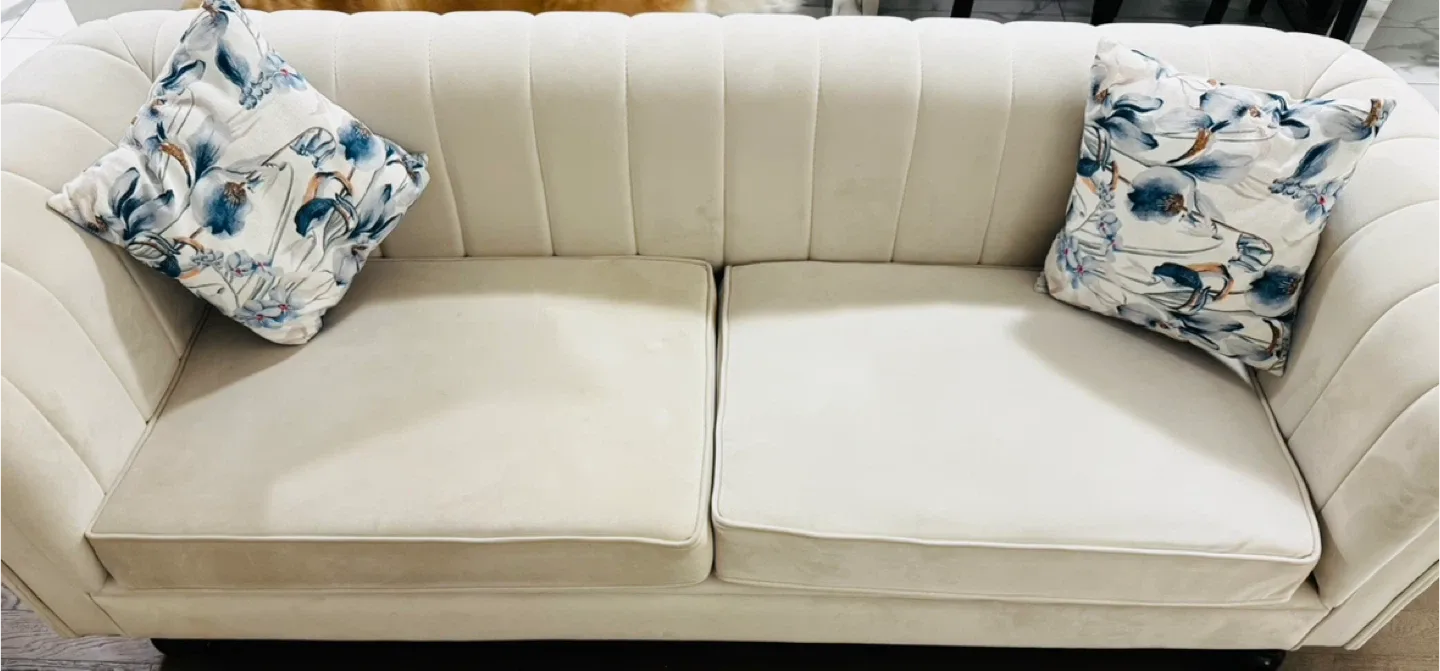 Beige Loveseat Sofa with Floral Pillows thumbnail
