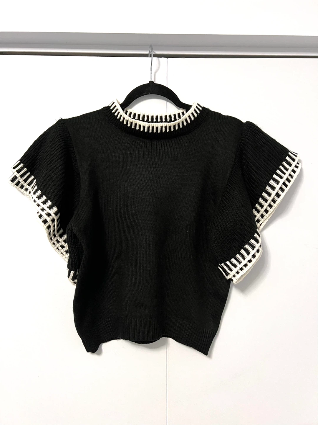 Black Ruffle Blouse with White Trim