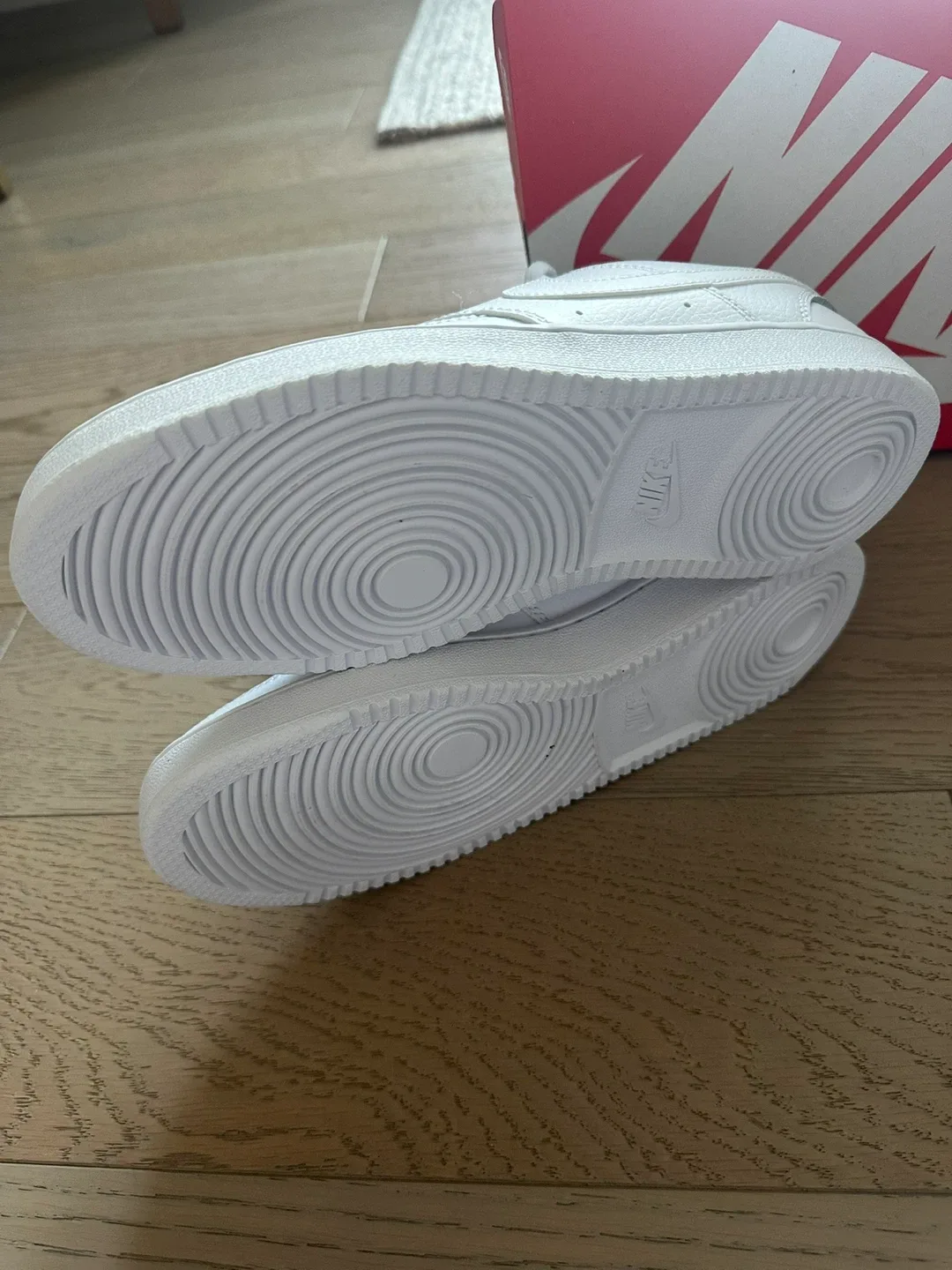 New white Nike court vision sneakers image indicator(4)