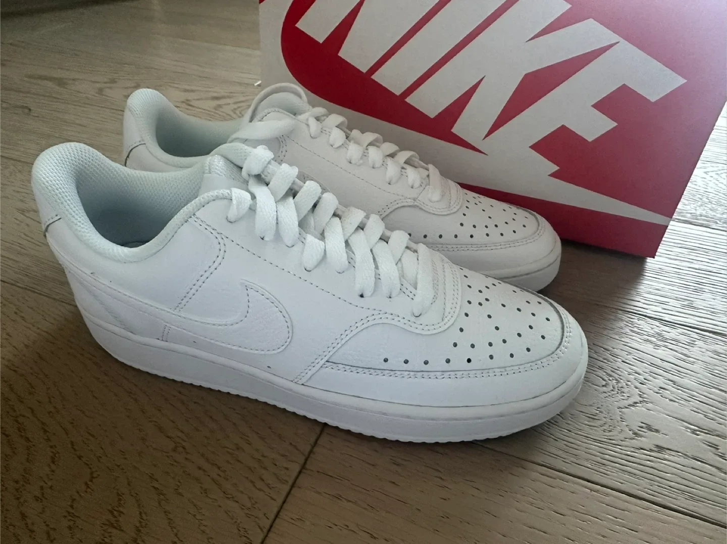 New white Nike court vision sneakers image indicator(3)