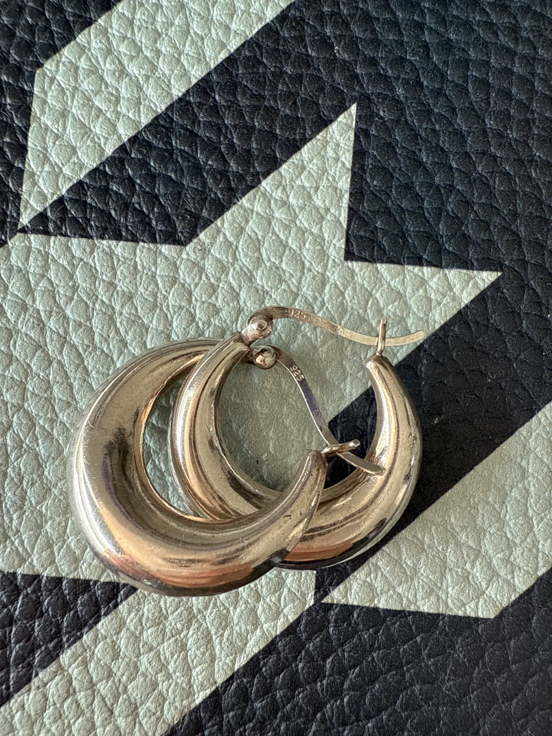 925 Silver Hoop earrings. Small bump on one of them.