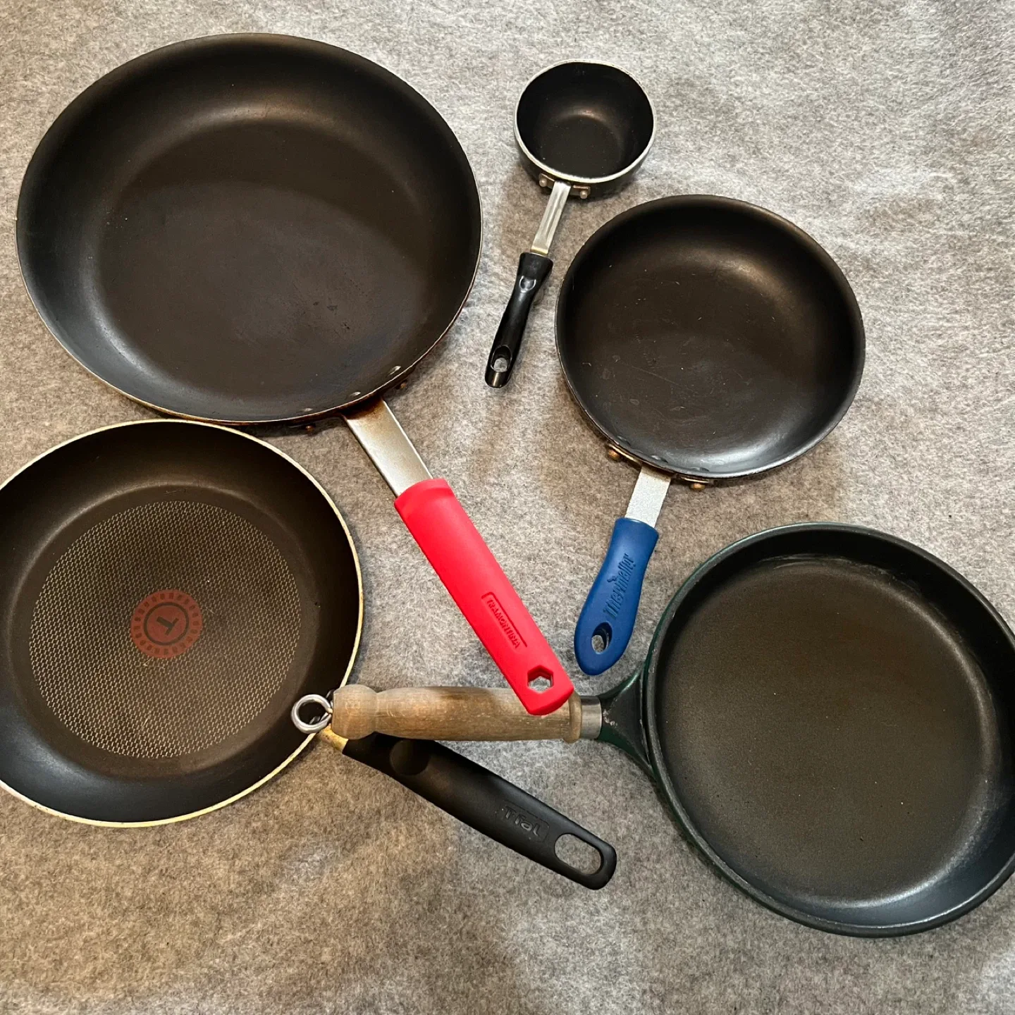 Variety of Used Frying Pans thumbnail