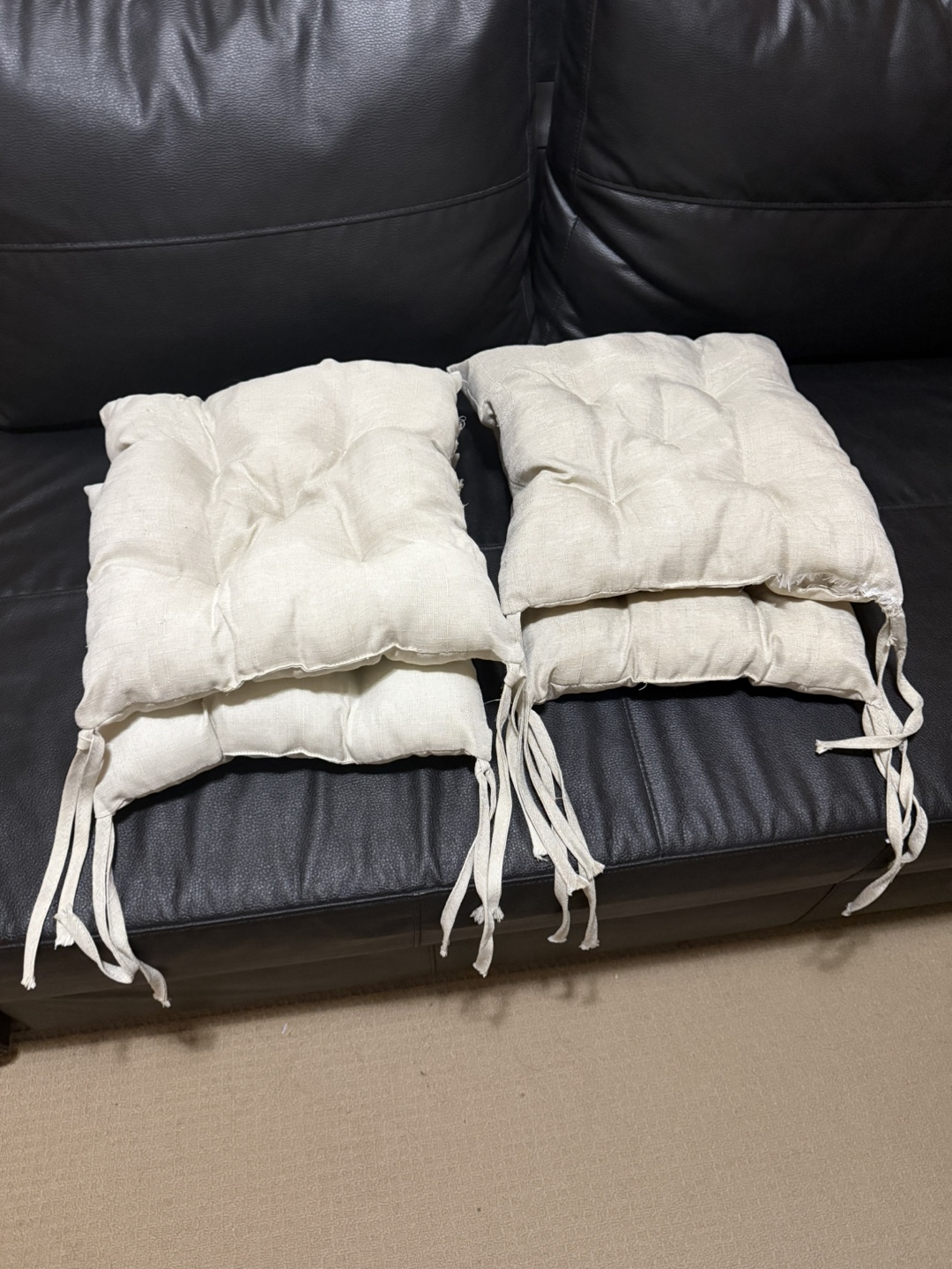 4 Beige Seat Cushions