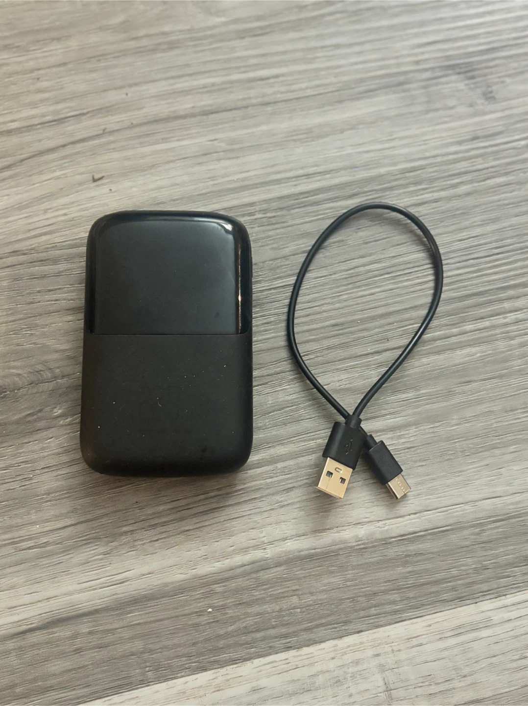 Black Portable Charger with USB Cable