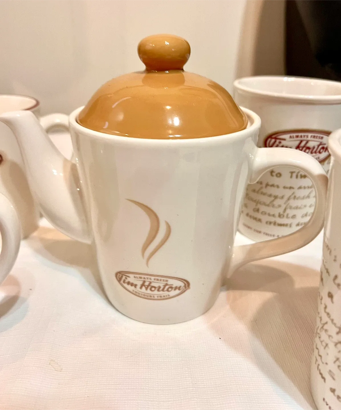 Tim Horton teapot and 4 limited edition mugs image indicator(4)
