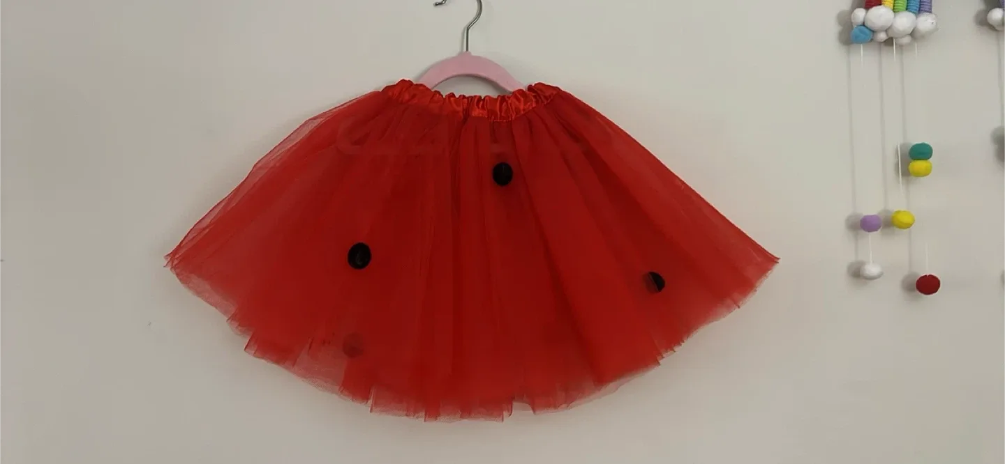 Red Tulle Skirt with Black Pom-Poms