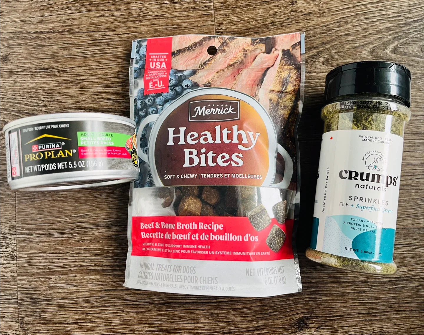 Assorted dog food items nee