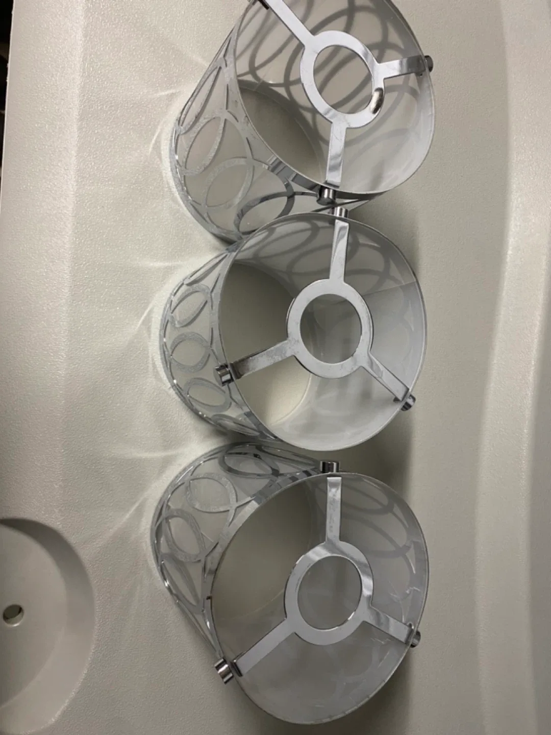 Set of 3 Silver Patterned lamp shade hanging over kitchen Island image indicator(2)