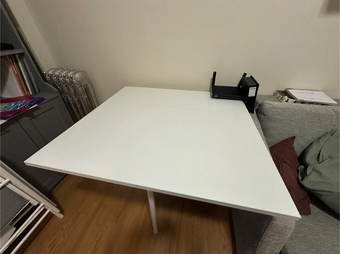 White Folding Table with Gray Chairs image indicator(2)