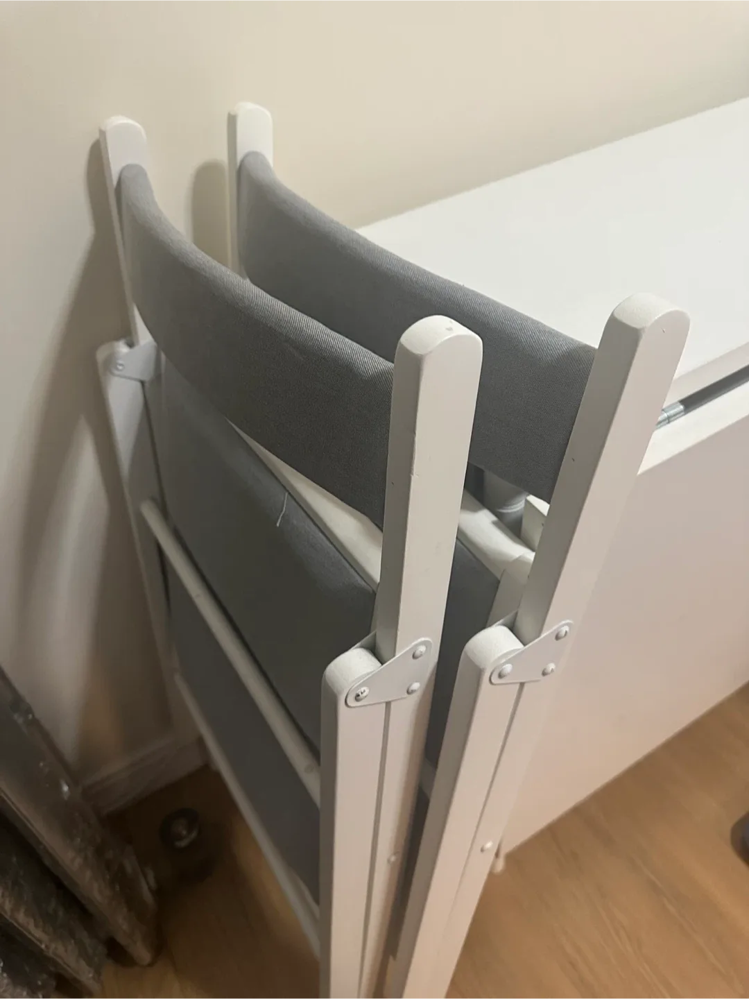 White Folding Table with Gray Chairs image indicator(4)