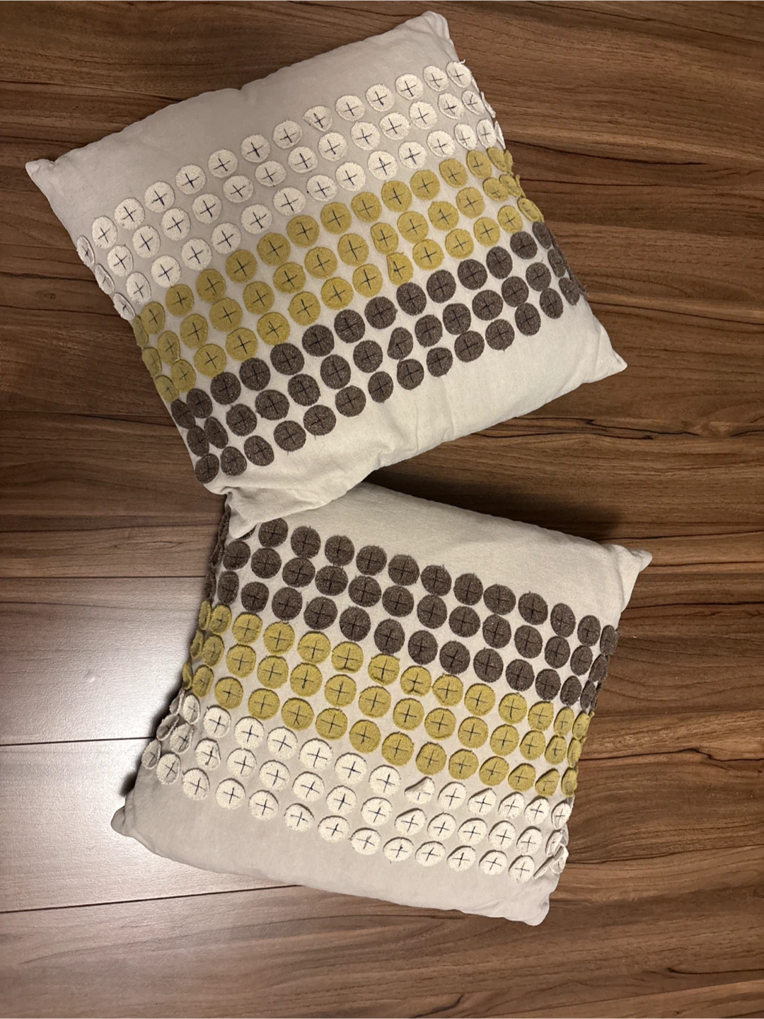 EQ3 linen throw pillows with felt embroidery