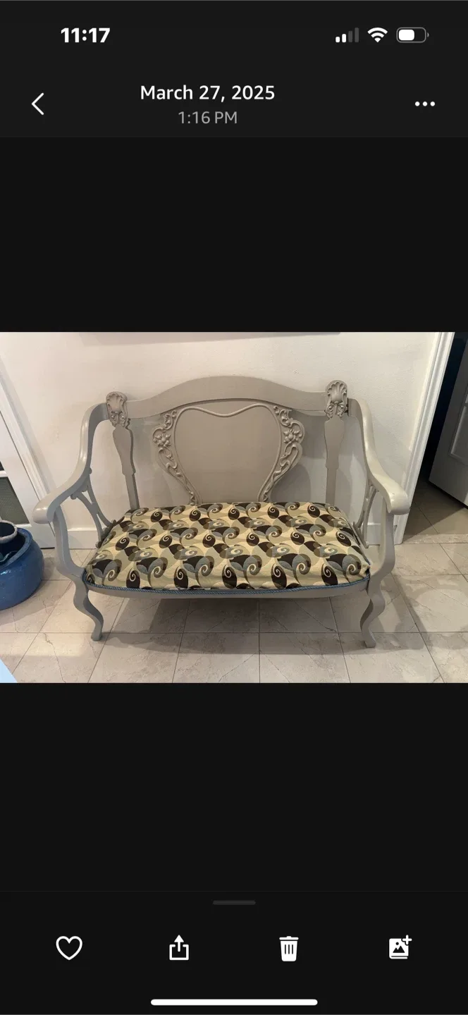 Grey Loveseat with Patterned Cushion