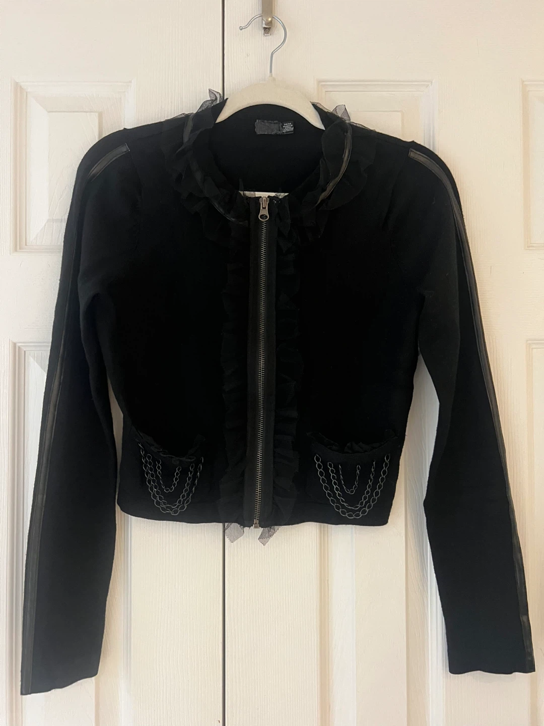 Black Top with Ruffle and Chain Detail