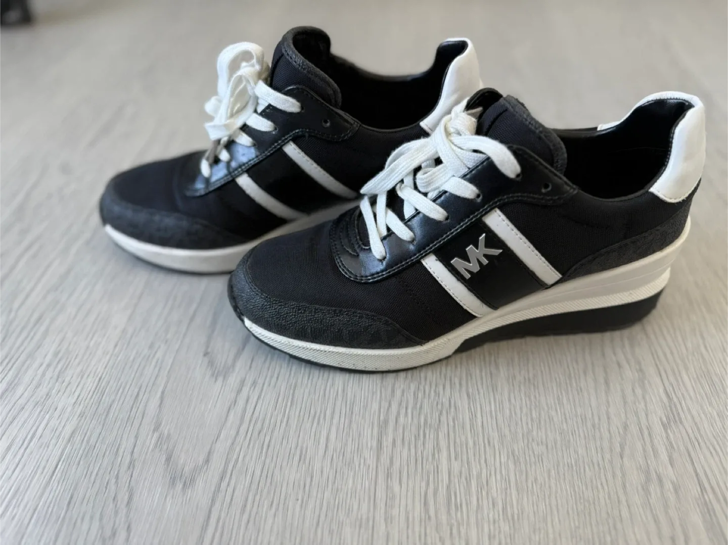 Michael Kors Black & White Sneakers. image indicator(3)