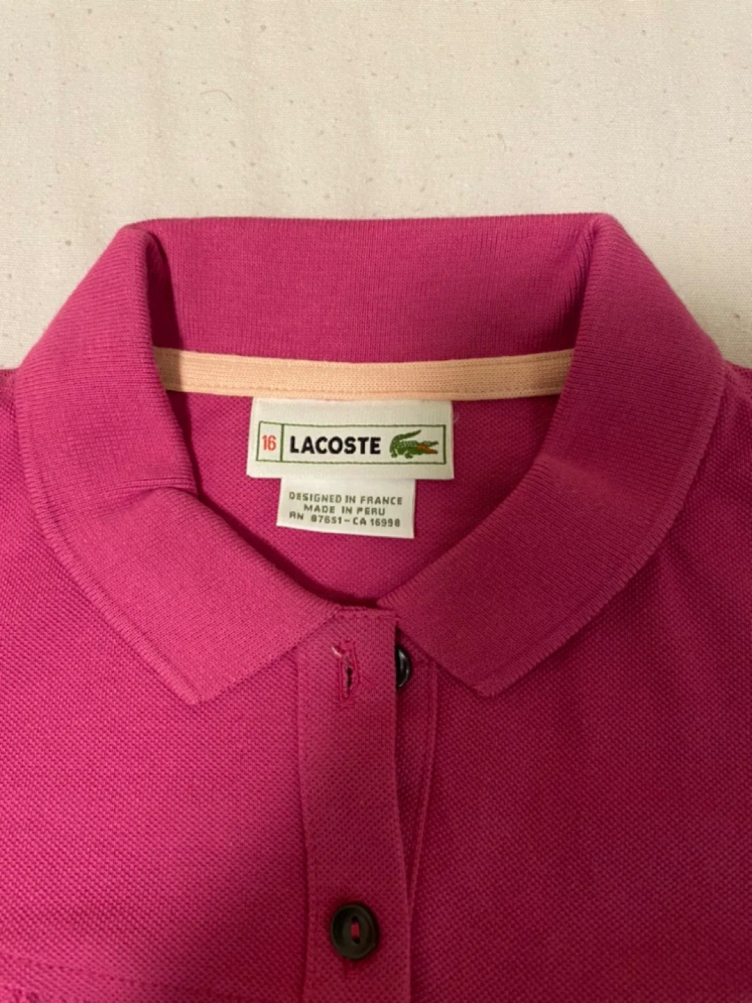 Lacoste Pink Polo T-shirts- Size 16 Yr image indicator(2)