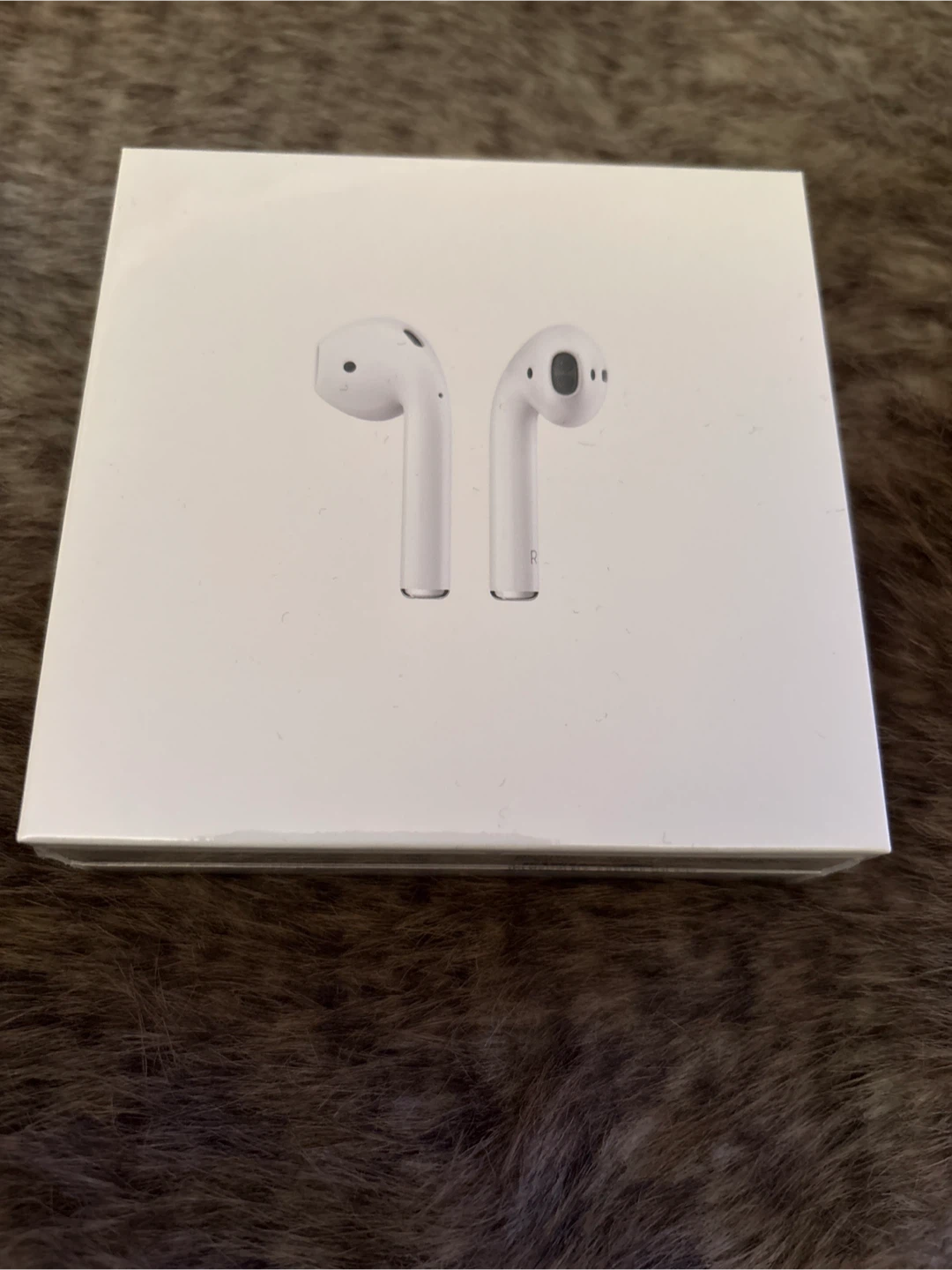 New Apple AirPods with Charging Case MV7N2AM/A