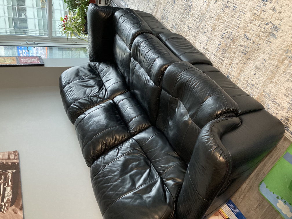 Black Leather Reclining Sofa