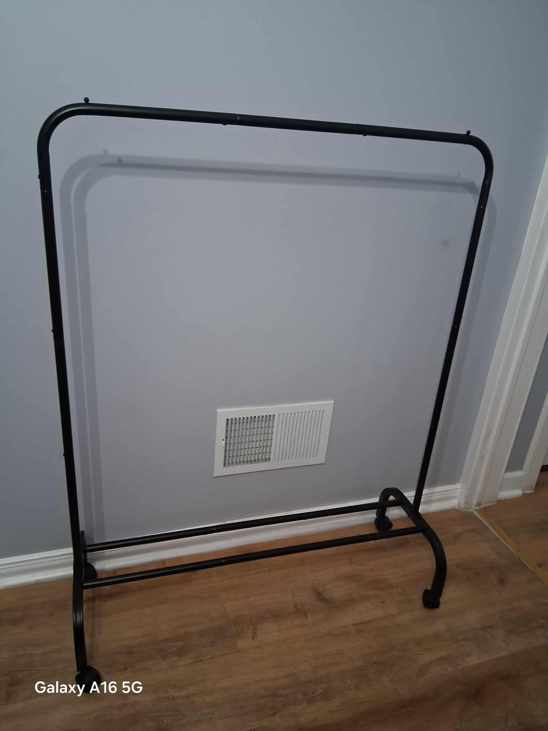 Black Metal Rolling Clothing Rack