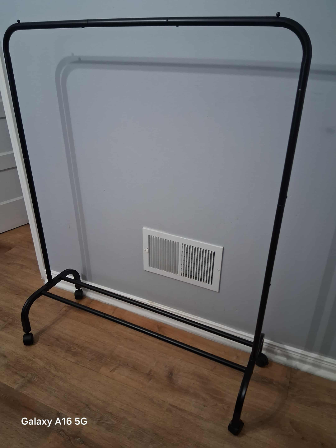 Black Metal Rolling Clothing Rack - photo 2