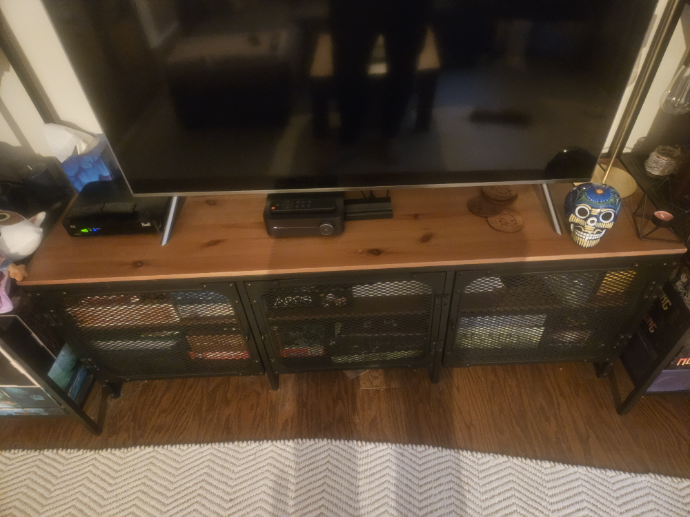 FJALLBO TV stand with metal mesh doors