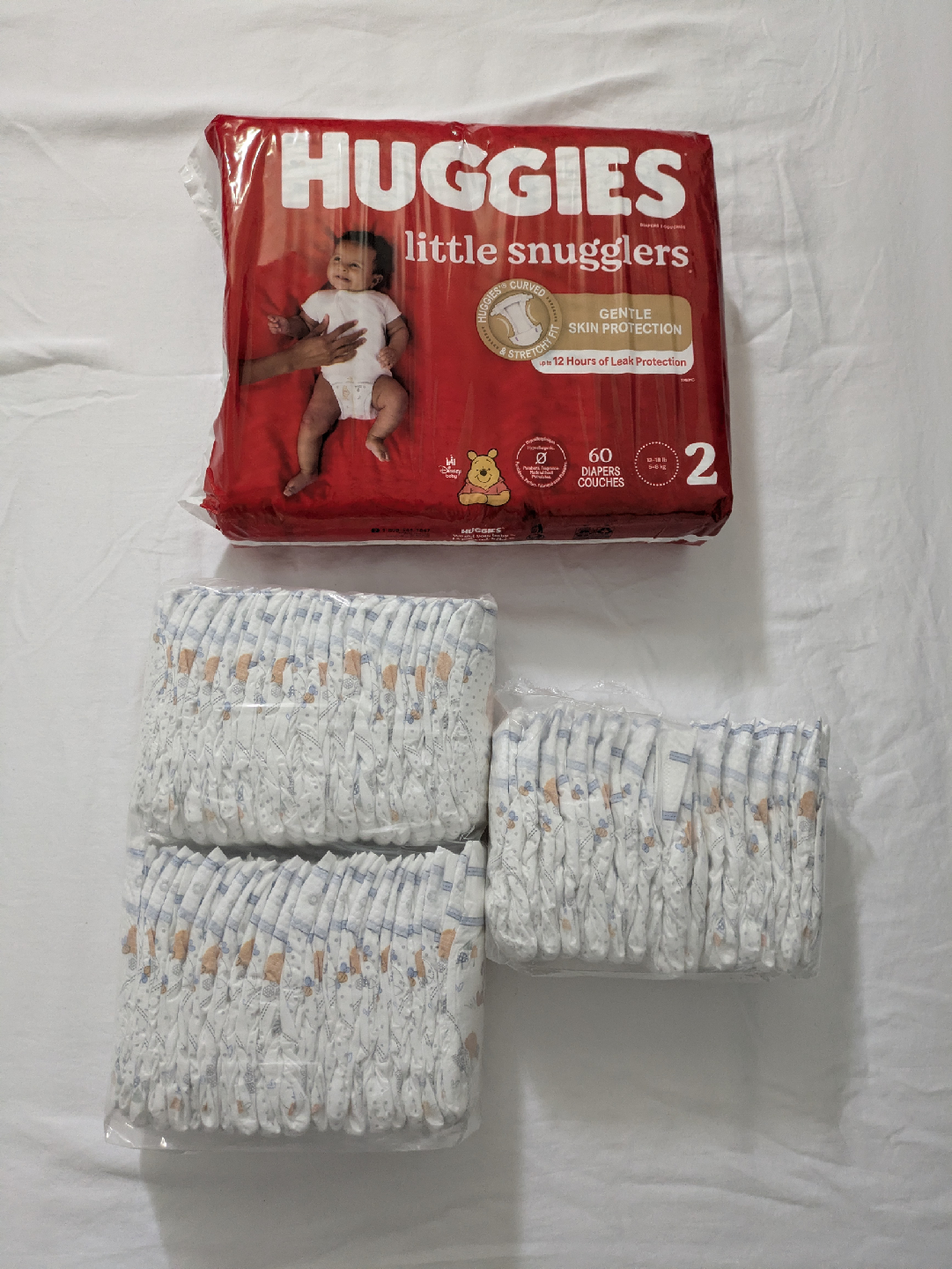 Huggies Snugglers Diapers 1/2+BONUS Royale Premium Diapers