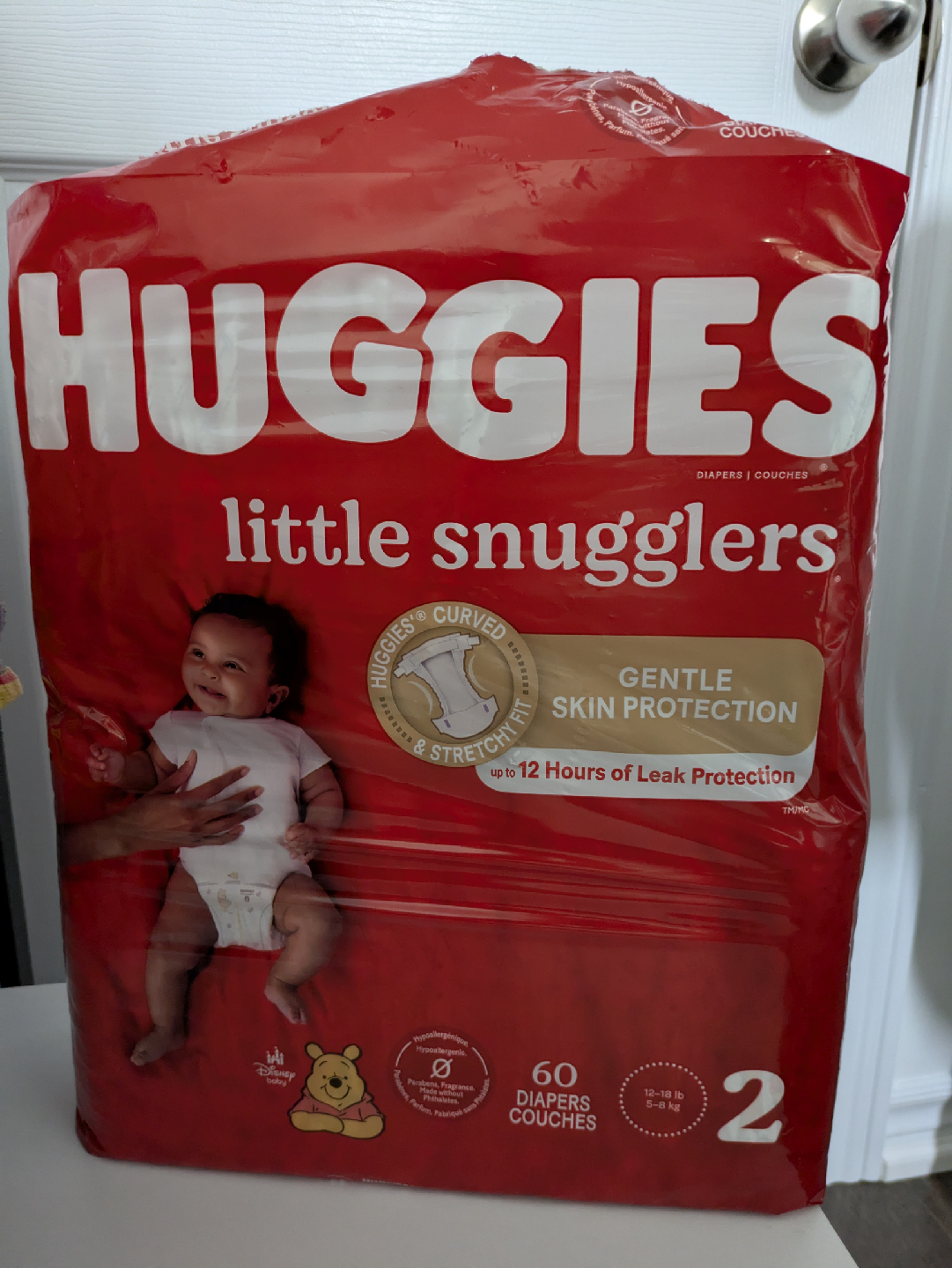 Huggies Snugglers Diapers 1/2+BONUS Royale Premium Diapers - photo 2