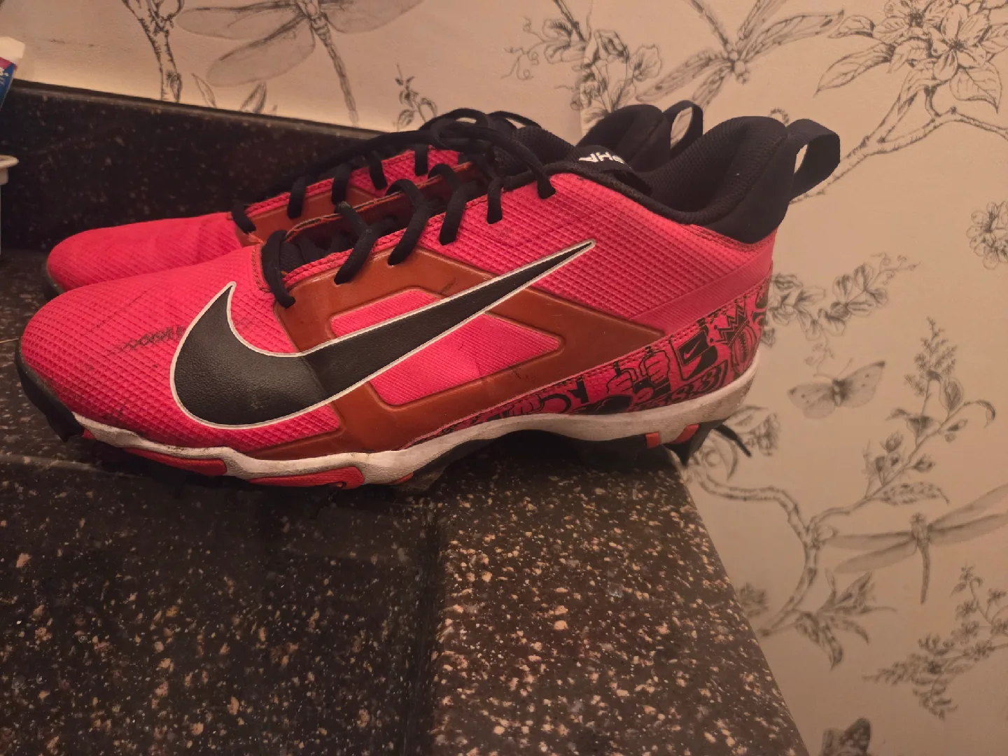 Nike and under armour football cleats