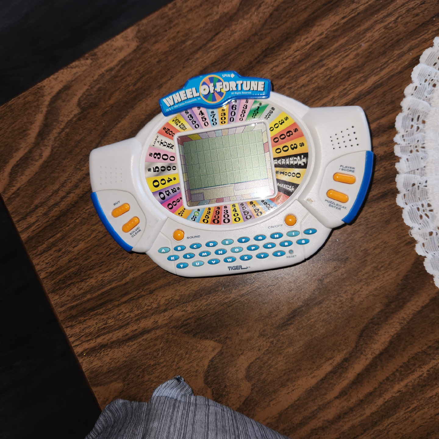 Wheel of Fortune Handheld Game by Tiger