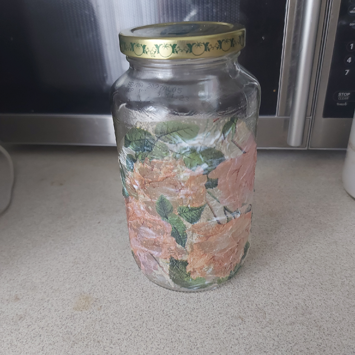Handcrafted Decorative Jar with Floral Design