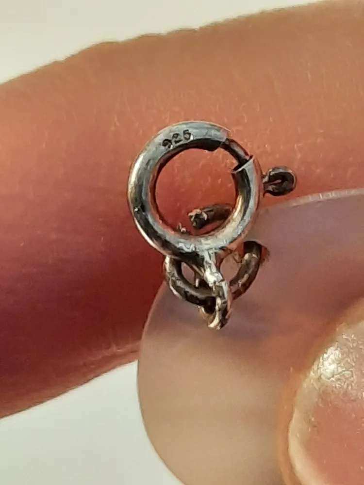 Necklace Lot: Black, White, Silver image indicator(8)