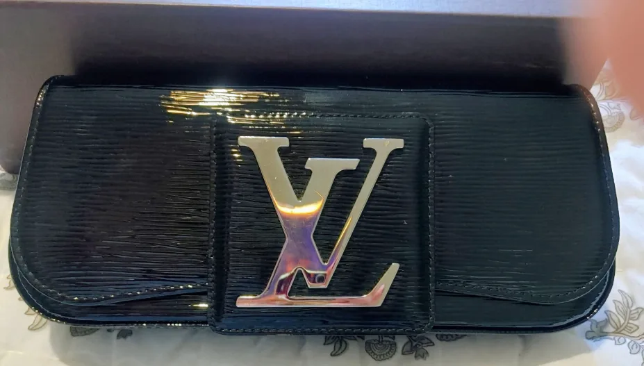 Louis Vuitton Sobe black patent clutch image indicator(2)