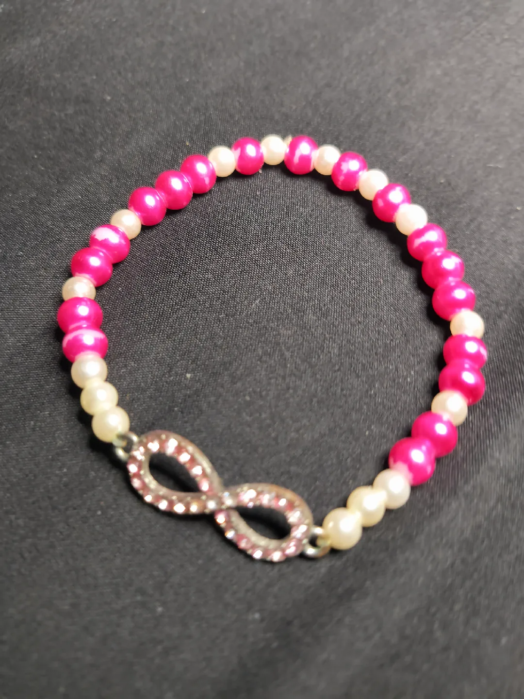 Pink & White Beaded Bracelet with Infinity Charm