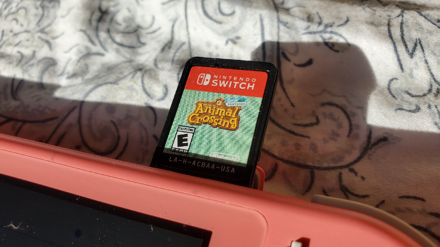 Nintendo Switch Lite with Animal Crossing New Horizons - photo 3