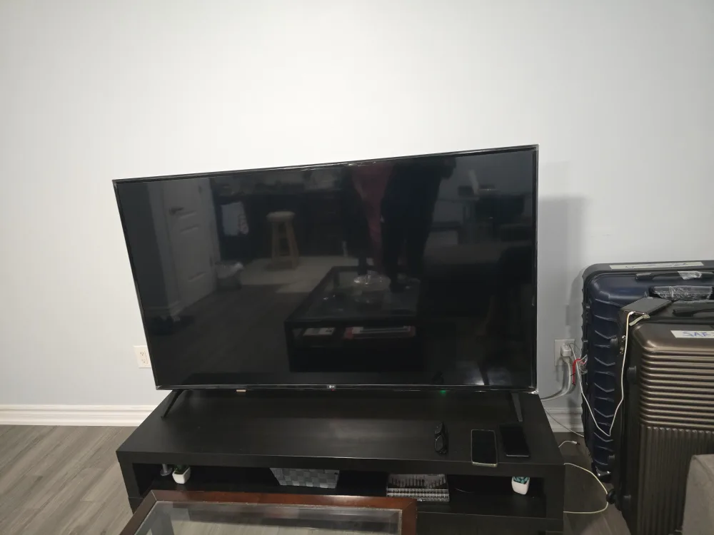 65" inch LG webOS TV UK6090PUA with table thumbnail