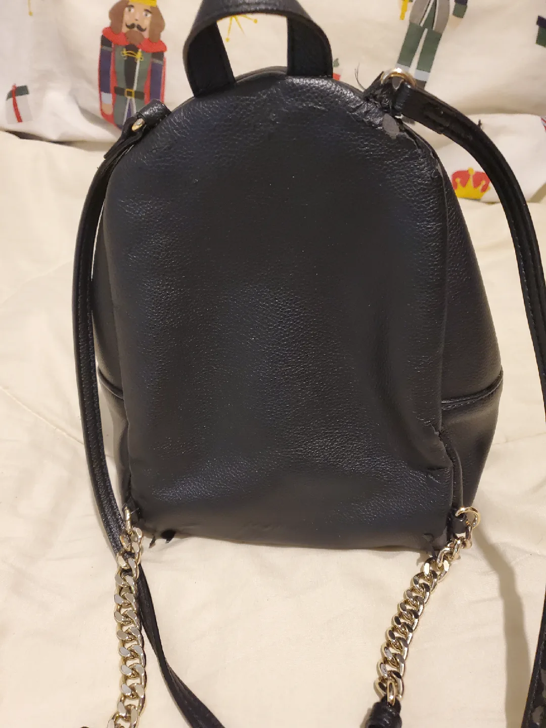 Victorias Secret black mini backpack with gold-like chain accent image indicator(9)