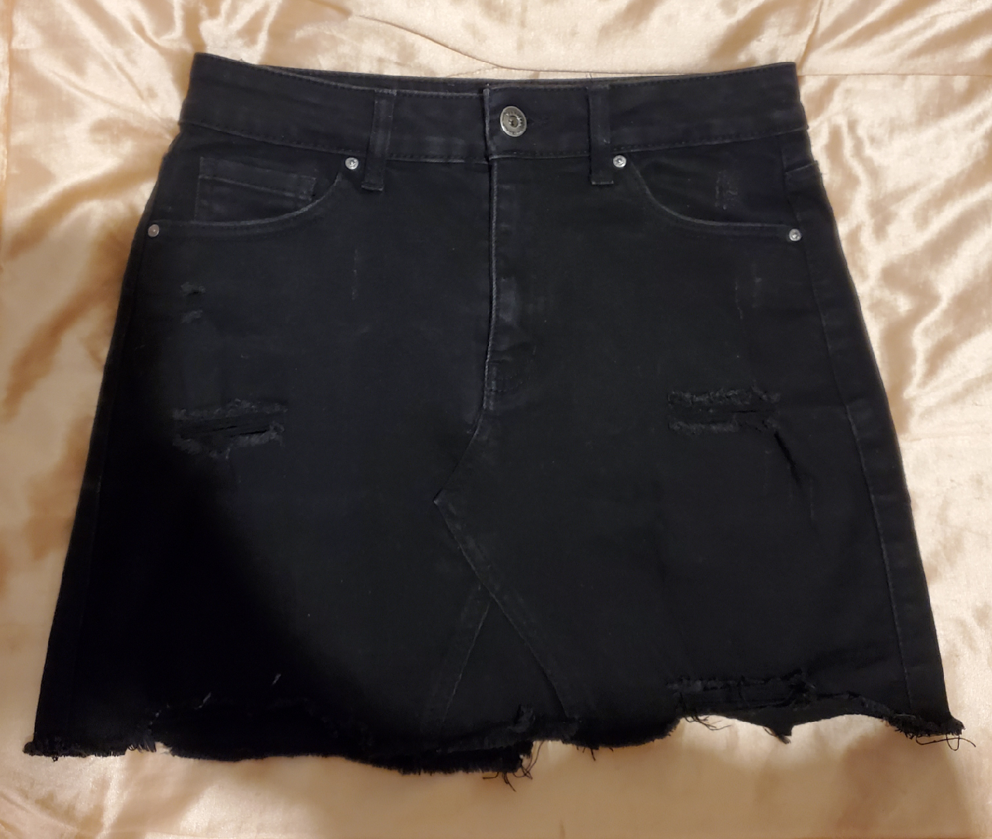 Wax Jean black denim mini skirt with frayed edges