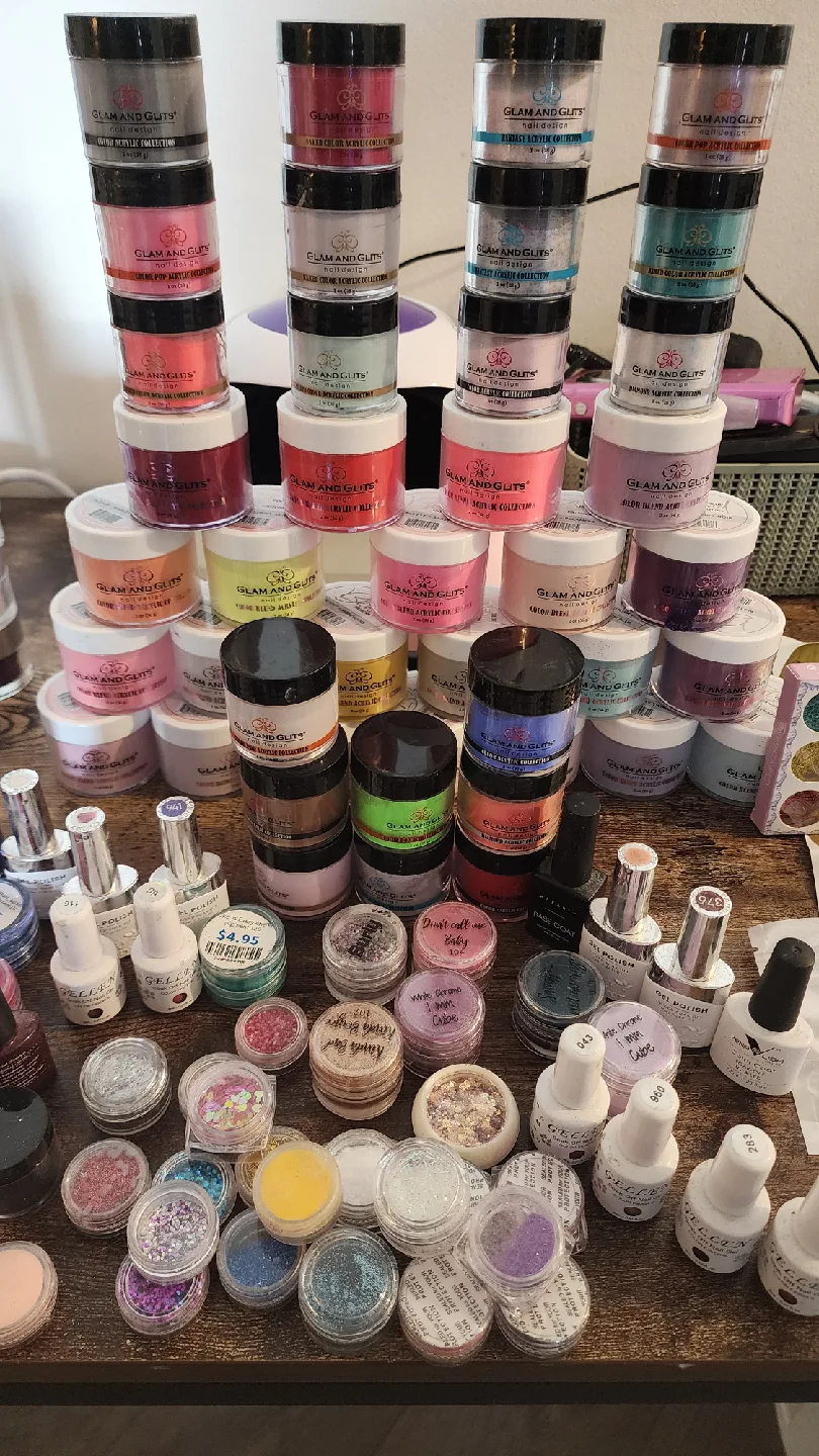 Variety of Nail Art Supplies: Powders, Gels, Glitters image indicator(2)