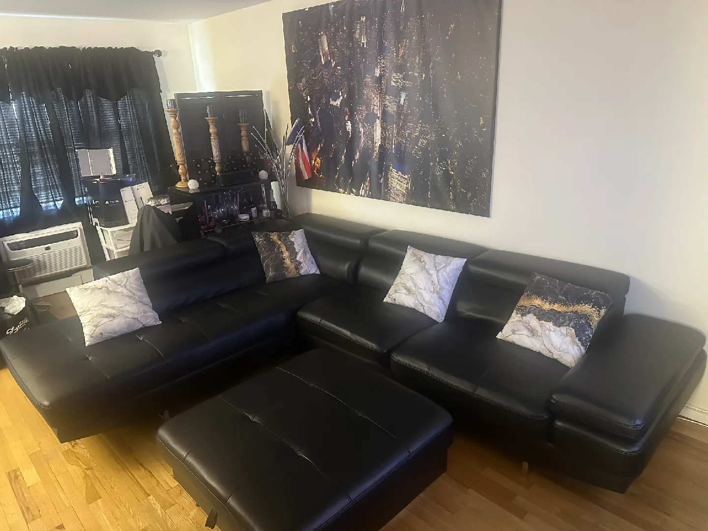 Black Leather Sectional Sofa with Ottoman image indicator(4)