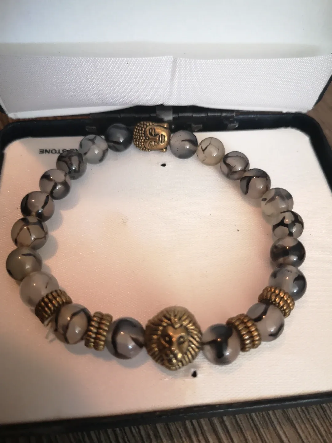 Beaded Bracelet with Lion & Buddha Charms thumbnail