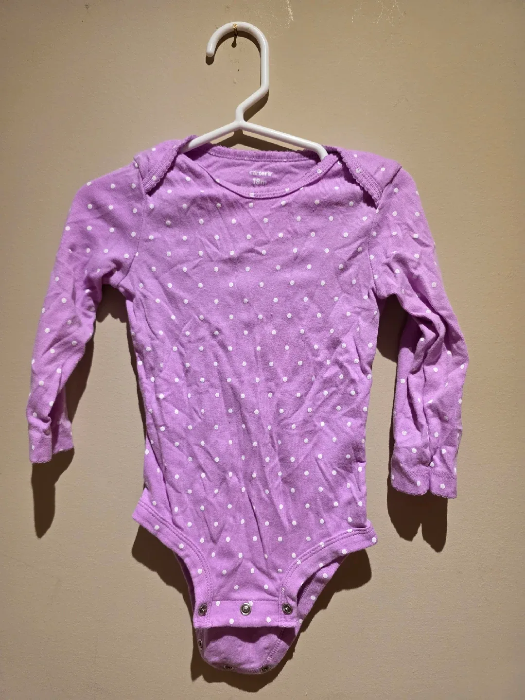 5 Baby Bodysuits for $5 - Carter's, Floral, Apple, Dinosaur image indicator(6)